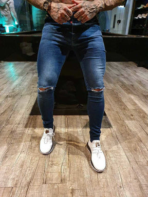 CALÇA JEANS SKINNY ESCURA RASGO NO JOELHO