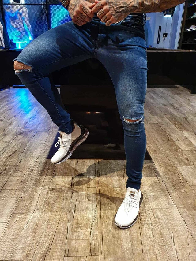 CALÇA JEANS SKINNY ESCURA RASGO NO JOELHO